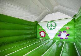 Buy inflatable bouncy castle in green with hippy style for children