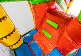 Bouncy castle Multiplay in Crocodil theme with slide for children. Order inflatable bouncy castles online now at JB Inflatables America