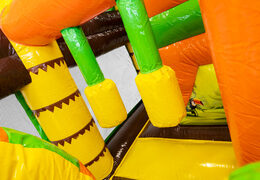 Order Multiplay air cushion with slide in theme Dinoworld for your children. Buy inflatable air cushions online now at JB Inflatables America