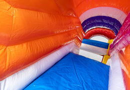 Bouncy castle Multiplay in Flamingo theme with slide for children. Order inflatable bouncy castles online now at JB Inflatables America