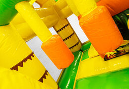 Bouncy castle Multiplay in Jungle theme with slide for children. Buy inflatable bouncy castles online now at JB Inflatables America