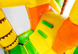 Bouncy castle Multiplay in Jungle theme with slide for children. Order inflatable bouncy castles online now at JB Inflatables America