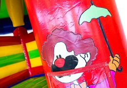 Buy a super indoor bouncy castle in a carousel circus theme for children. Buy bouncy castle online at JB Inflatables Netherlands