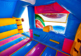 Inside of the Double Slide Combo Bouncy Castle in blue, yellow, and purple at JB