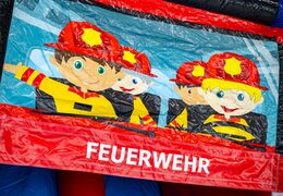 Bouncy Castle Firefighter theme with illustration of German firefighters, order online