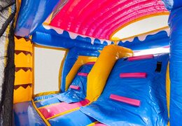 Climbing wall of Multiplay Doubleslide in beach theme blue yellow pink