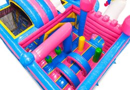 Inside of inflatable castle with arches, pillars, and punching bags for sale at JB