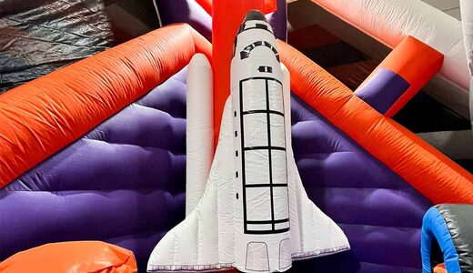 Opblaasbaar springpark Cosmic ruimtevaart thema 