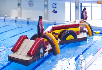 Buy a double inflatable Zig Zag pirate themed obstacle course for both young and old. Order inflatable water attractions now online at JB Inflatables America