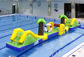 Order 12 meter long inflatable Hawaii run obstacle course with 2 slides for both young and old. Buy inflatable obstacle courses online now at JB Inflatables America