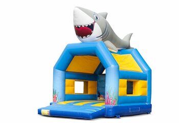 Buy unique standard bounce houses with a 3D shark object on the top for kids. Buy bounce houses online at JB Inflatables America