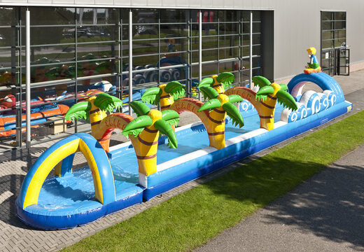 Spectacular inflatable beach belly slide 18 meters long with an extra wide track for children. Buy inflatable belly slides now online at JB Inflatables America