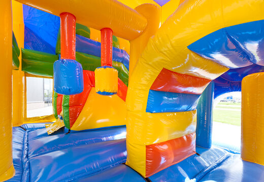 Medium inflatable clown themed bouncer with slide and pillars on the jumping surface, buy for children. Order inflatable bouncers online at JB Inflatables America