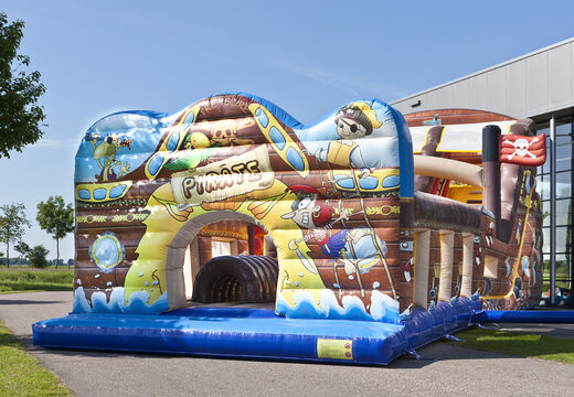 Buy an inflatable extra wide slide in the Pirates world theme with 3D obstacles for children. Order inflatable slides now online at JB Inflatables America