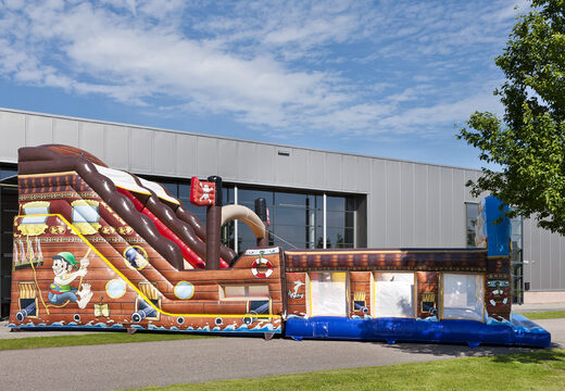 Mega inflatable slide in Pirates world theme with 3D obstacles for children. Buy inflatable slides now online at JB Inflatables America