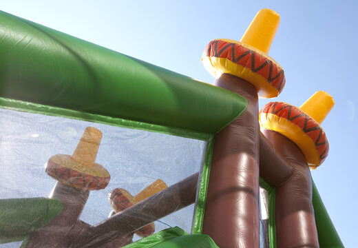 Order a 17 meter wide unique cowboy themed obstacle course with 7 game elements and colorful objects for children. Buy inflatable obstacle courses online now at JB Inflatables America