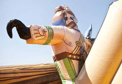 Buy a spectacular inflatable slide in a striking pirate ship shape with cool 3D objects and full color prints for kids. Order inflatable slides now online at JB Inflatables America