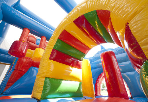 Multiplay shark bouncer with a slide, pillars on the jumping surface and striking 3D object for children. Order inflatable bouncers online at JB Inflatables America