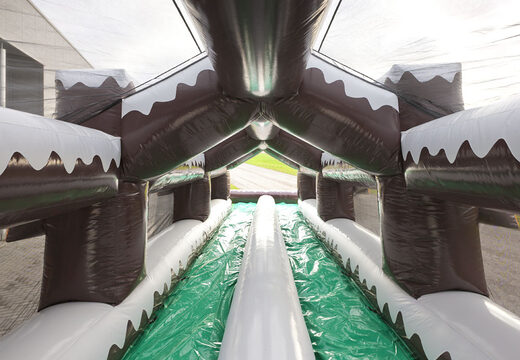 Get an inflatable double rollerslide in winter theme for both young and old. Buy inflatable winter attractions online now at JB Inflatables America