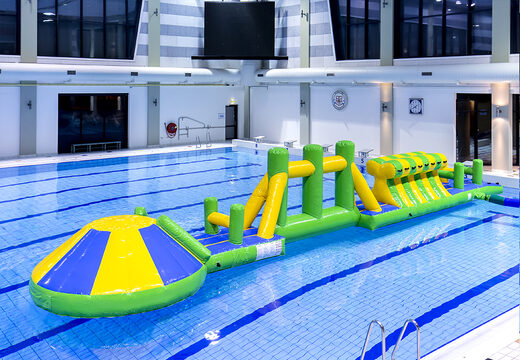Order swimming pool adventure run green/blue 16m with challenging obstacle objects and round slide for both young and old. Buy inflatable water attractions online now at JB Inflatables America