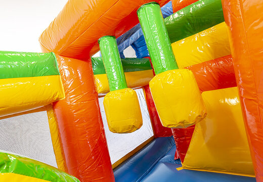 Multiplay party bouncer with a slide, fun objects on the jumping surface and eye-catching 3D objects for kids. Order inflatable bouncers online at JB Inflatables America