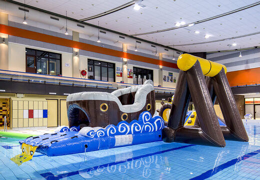 Airtight inflatable pirate play island with a vine, climbing tower, round slide and obstacles for both young and old. Order inflatable water attractions now online at JB Inflatables America
