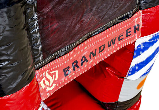 Buy a bounce house in the fire department theme with a slide and 3D objects for children. Order bounce houses online at JB Inflatables America 