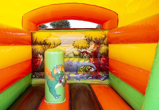 Mini roofed bounce house yellow and green in dinosaur theme to buy for kids. Bounce houses available at JB Inflatables America online