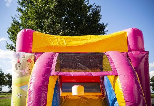 Small inflatable multifun bounce house yellow and pink in princess fairytale theme to buy. Order online at JB Inflatables America