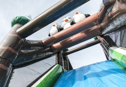 Buy a 17 meter wide winter themed inflatable obstacle course with 7 game elements and colorful objects for kids. Order inflatable obstacle courses now online at JB Inflatables America