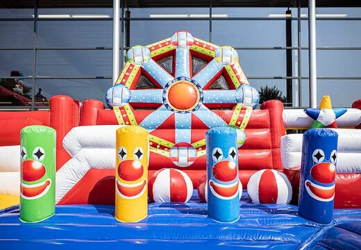 Circus bounce house with slides, obstacles with fun circus themed prints for kids. Order bounce houses online at JB Inflatables America