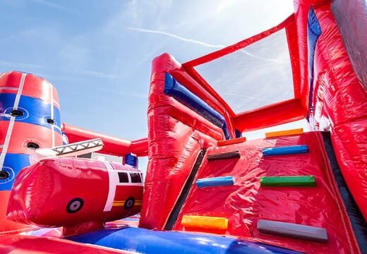 Order a covered multiplay fire brigade bouncer in a limited height of 2.74 meters and with a slide for both old and young. Buy bouncers online at JB Inflatables America 