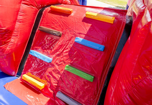 Multiplay indoor fire brigade bouncer with a slide for children. Order bouncers online at JB Inflatables America 