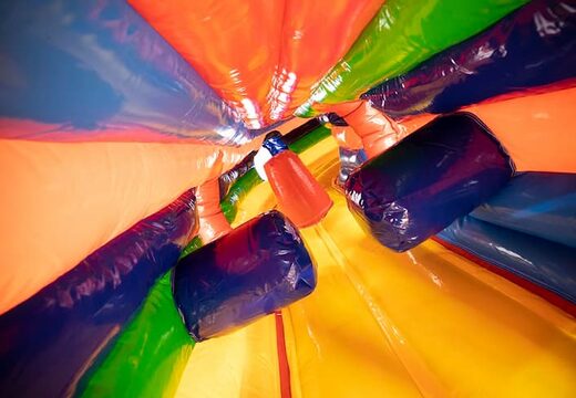 Order a circus crawl tunnel bouncer with obstacles, a climbing slope and a slide for kids. Buy bouncers online at JB Inflatables America 