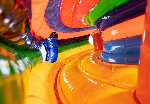 Circus themed inflatable crawl tunnel with obstacles, use a climbing ramp and slide for children. Buy bouncers online at JB Inflatables America 