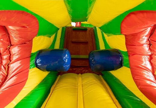 Order a Lion crawl tunnel bouncer with obstacles, a climbing ramp and a slide for kids. Buy bouncers online at JB Inflatables America 