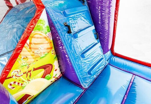 Multiplay XXL Candyland bounce house in a unique design, a slide and 3D objects for children. Buy bounce houses online at JB Inflatables America 