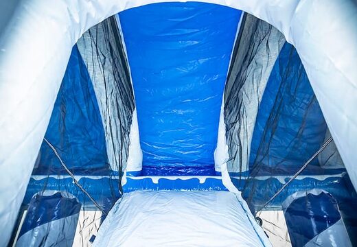 Inflatable multiplay ice bouncer with a slide in the middle and 3D objects for kids. Order bouncers online at JB Inflatables America 