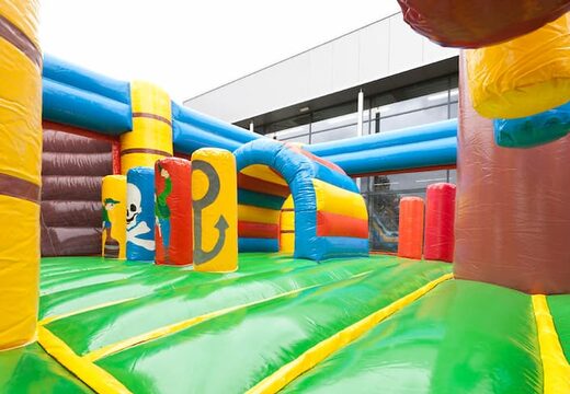 Pirate boat themed bouncer with a slide and 3D objects for children. Order bouncers online at JB Inflatables America 