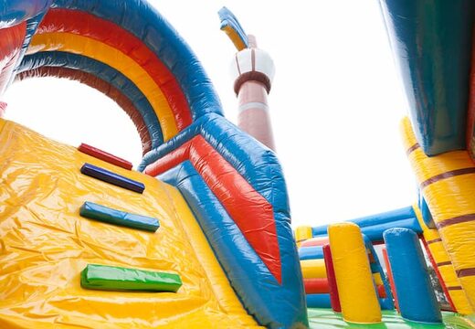 Large inflatable indoor pirate boat multiplay bouncer with slide in Lego theme for kids. Buy bouncers online at JB Inflatables America 