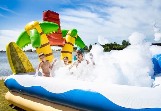 Buy an inflatable large bubble park in Hawaii theme for kids. Order inflatable bounce houses at JB Inflatables America