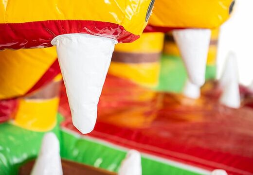 Buy indoor inflatable multiplay Jungleworld bounce house with a slide and 3D objects for children. Order bounce houses online at JB Inflatables America 