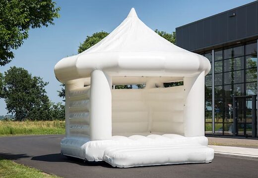 Standard white carousel wedding pillow bounce houses for sale for kids. Inflatable bounce houses online for sale at JB Inflatables America