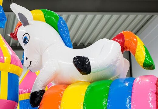 Medium inflatable multiplay bouncy castle with slide in fairy wonderland theme for children. Order inflatable bouncy castles online at JB Inflatables America