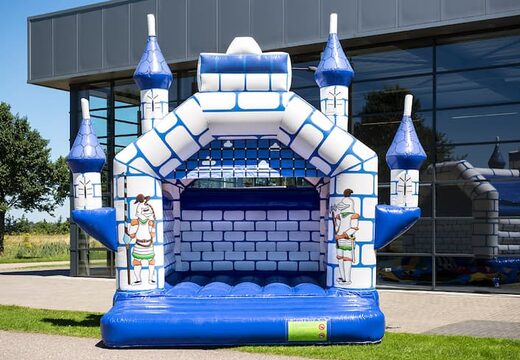Order standard castle bounce houses in blue with a knight theme for children. Buy bounce houses online at JB Inflatables America