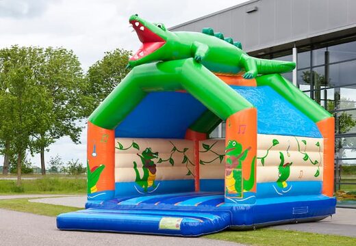Super bounce house with roof in crocodile theme for kids. Buy bounce houses online at JB Inflatables America