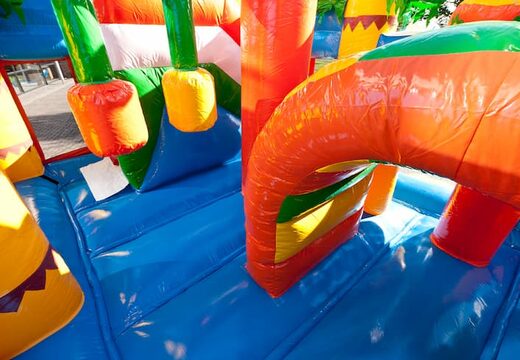 Bouncer in beach theme with a slide for children. Buy inflatable bouncers online at JB Inflatables America