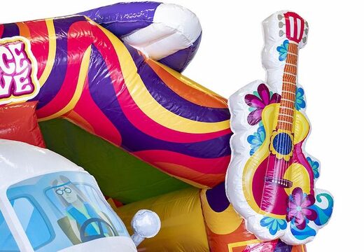 Bestel opblaasbaar luchtkussen in hippy thema met glijbaanvoor kinderen