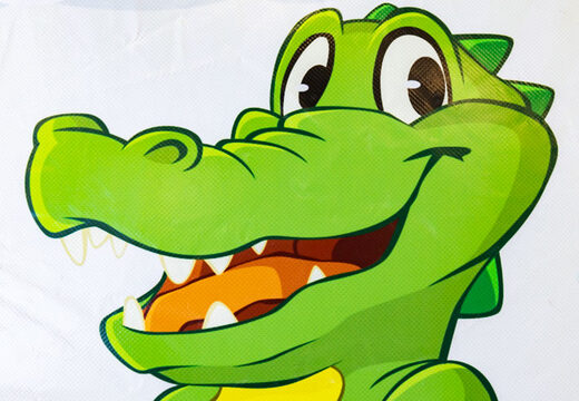 Order inflatable Multiplay bouncy castle with slide in Crocodil theme for children. Buy inflatable bouncy castles online at JB Inflatables America