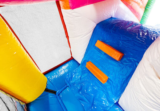 Bouncy castle Multiplay in Flamingo theme with slide for children. Buy inflatable bouncy castles online now at JB Inflatables America